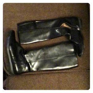 Black leather knee high waterproof boots